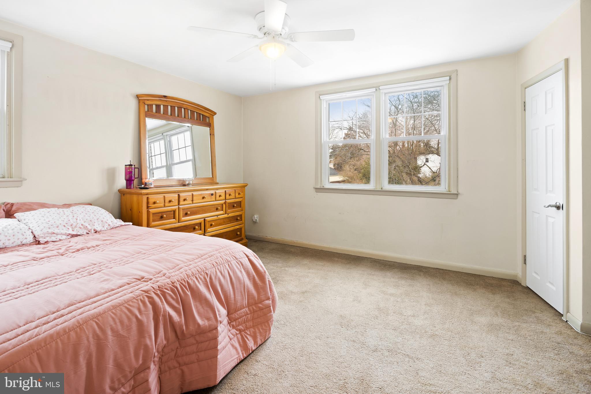 7851 Horrocks Street Philadelphia, PA 19152 - Photo 6 of 15 a bedroom with a bed and a window