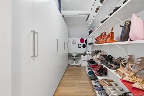 a bathroom with a sink a toilet and a shower