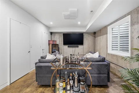 a kitchen with a dining table and chairs