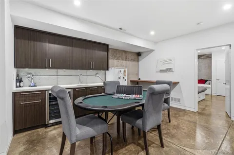 a bedroom with a large bed and a large window