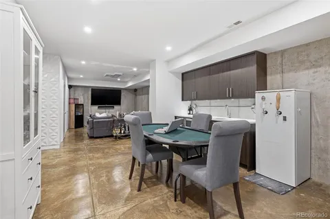 a view of barbeque area with seating