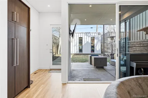 a view of a dining room kitchen counter top space and a wooden floor