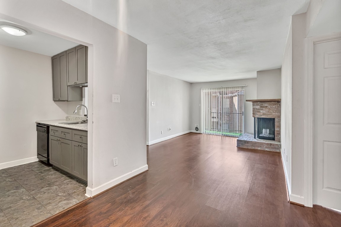 2800 Jeanetta Street, Unit 602 Houston, TX 77063 - Photo 14 of 29 a view of a kitchen cabinets and wooden floor