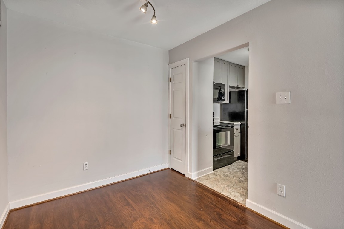 2800 Jeanetta Street, Unit 602 Houston, TX 77063 - Photo 18 of 29 wooden floor in an empty room