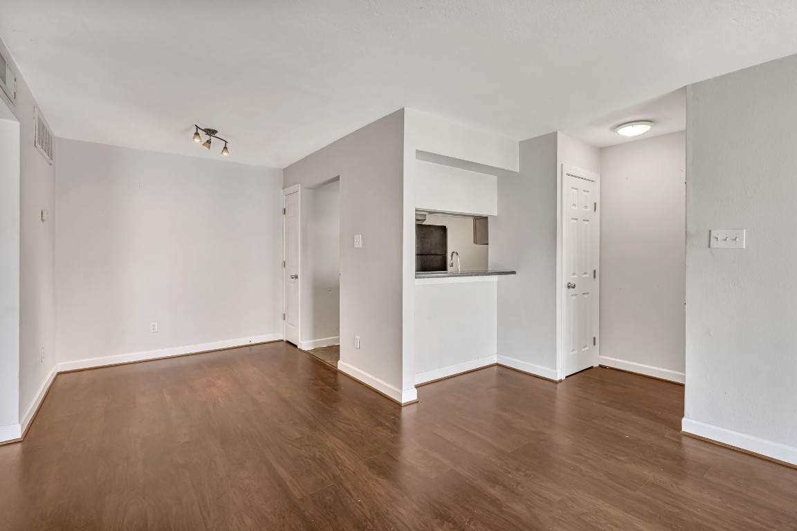 2800 Jeanetta Street, Unit 602 Houston, TX 77063 - Photo 10 of 29 a view of empty room with wooden floor