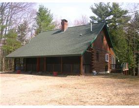the front porch of the home offers a...