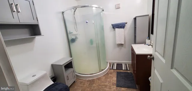 a bathroom with a sink and toilet