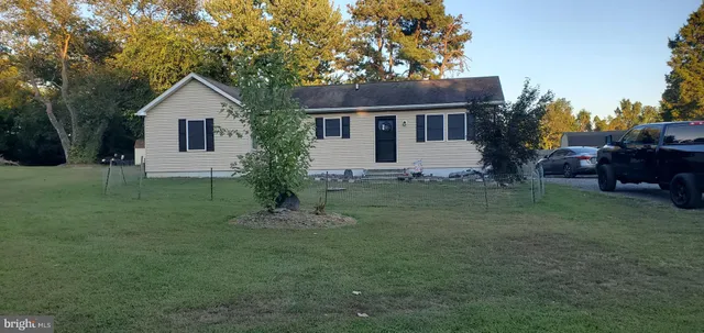 a house view with a garden space