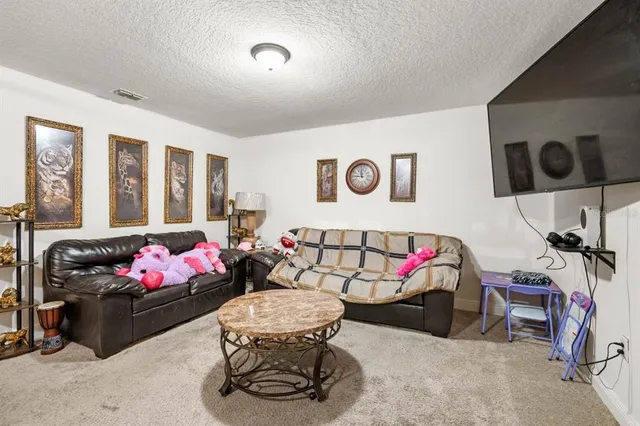 a bedroom with furniture and a couch