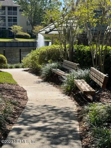 a garden view with a seating space