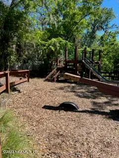 a view of outdoor space with water fountain