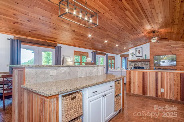a kitchen with a stove and cabinets