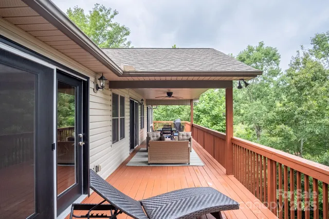 a view of a patio with a table chairs and a porch