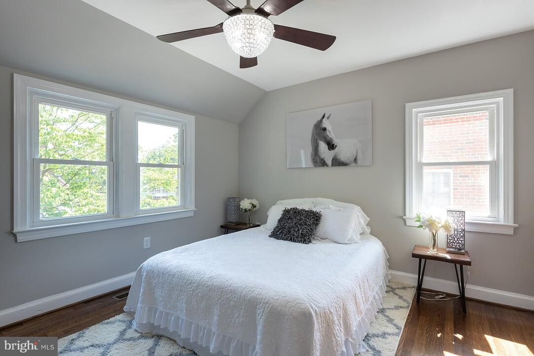2208 Shepherd Street Northeast Washington, DC 20018 - Photo 12 of 19 a bedroom with a bed and a window