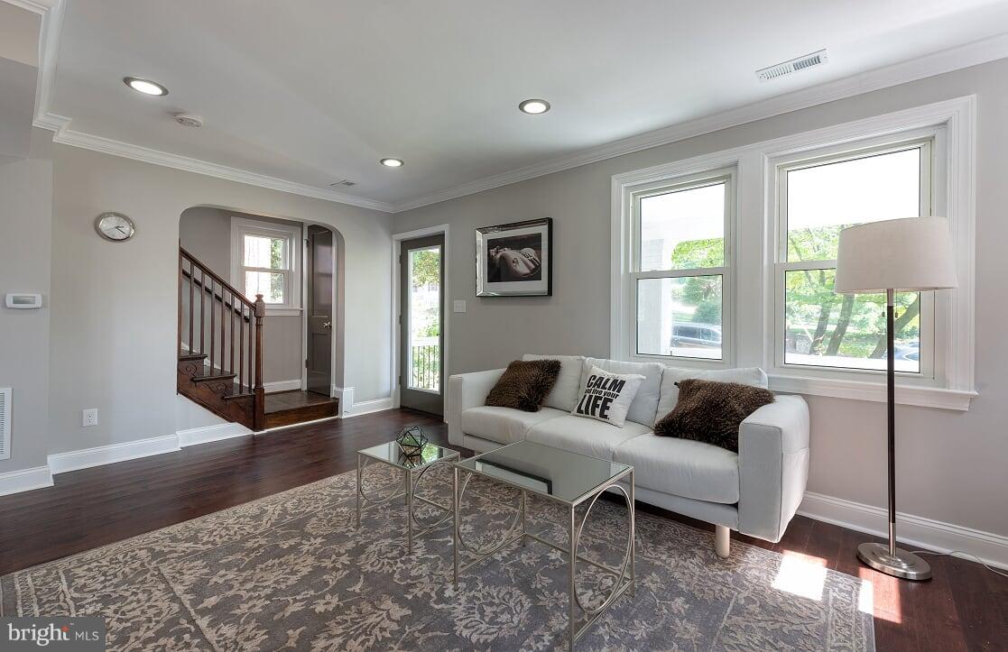 2208 Shepherd Street Northeast Washington, DC 20018 - Photo 4 of 19 a living room with furniture and a window