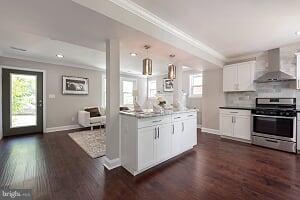 2208 Shepherd Street Northeast Washington, DC 20018 - Photo 8 of 19 a kitchen with sink cabinets and wooden floor