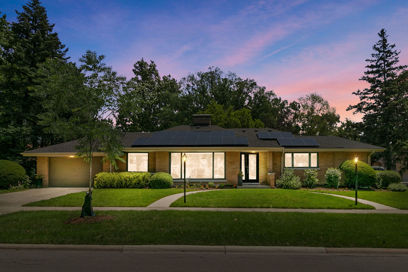 379 Audubon Road Riverside, IL 60546 - Photo 1 of 37 a front view of a house with a yard