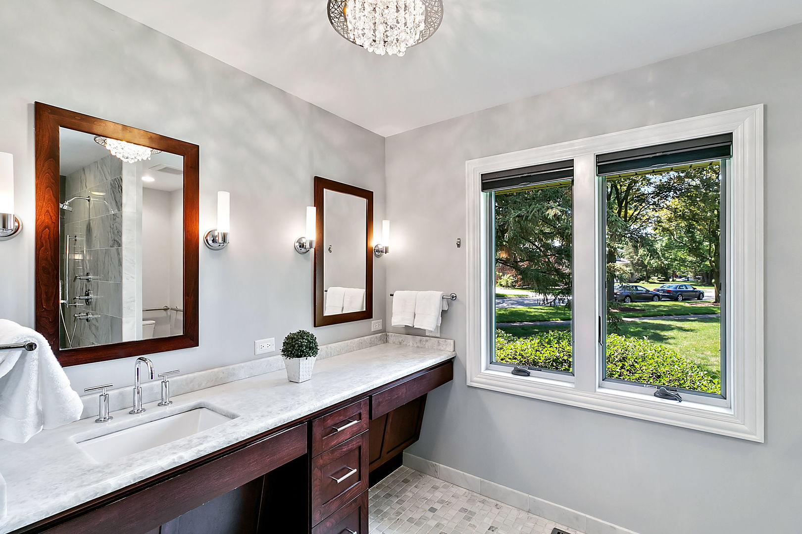 379 Audubon Road Riverside, IL 60546 - Photo 25 of 37 a bathroom with a double vanity sink and a mirror