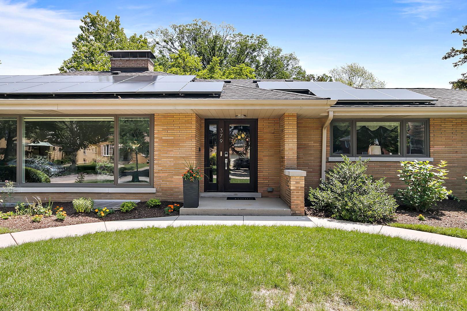 379 Audubon Road Riverside, IL 60546 - Photo 4 of 37 front view of a house with a yard