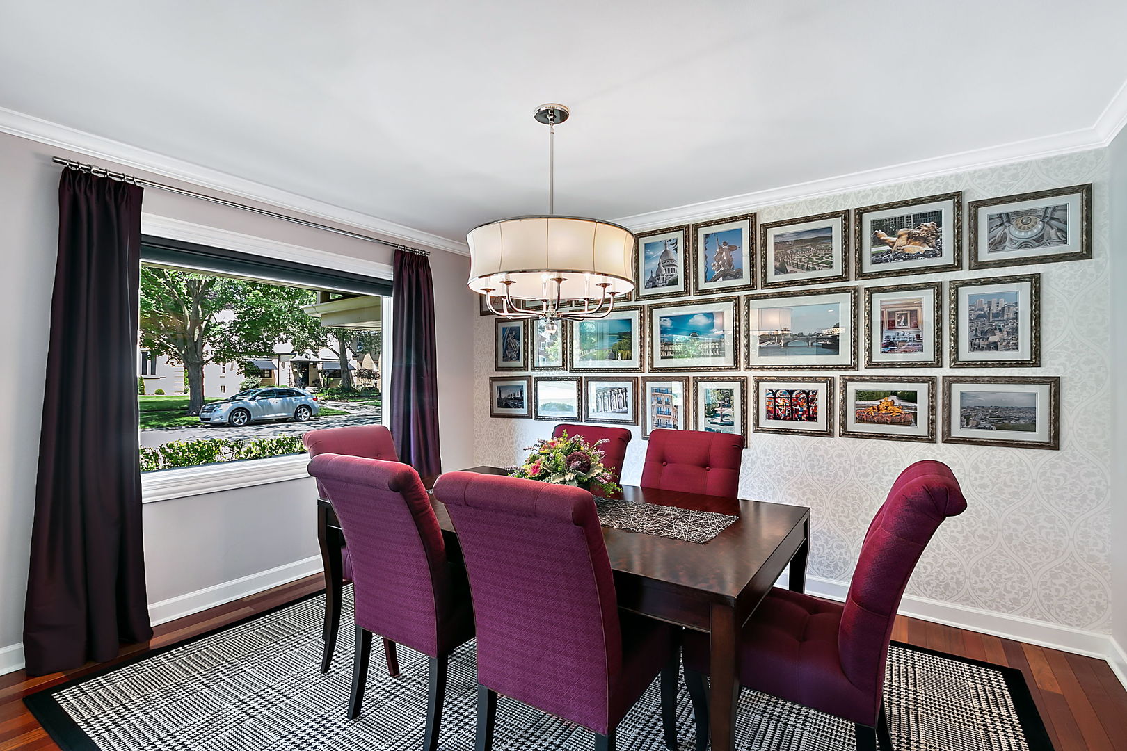 379 Audubon Road Riverside, IL 60546 - Photo 10 of 37 a dining room with furniture a rug and a floor to ceiling window
