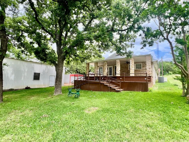 a view of a house with a patio