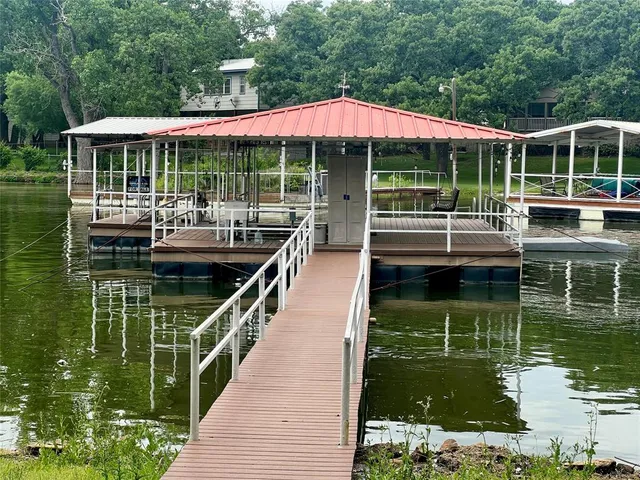 a view of yard with swimming pool and outdoor seating