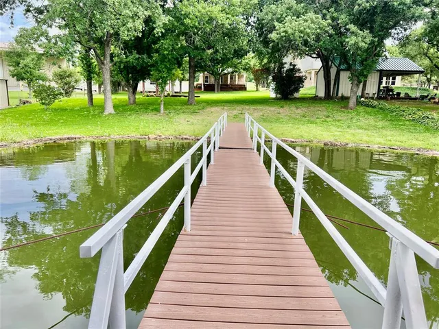 a house view with a lake view
