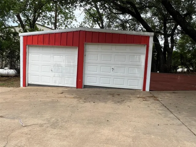 a view of a house with a garage