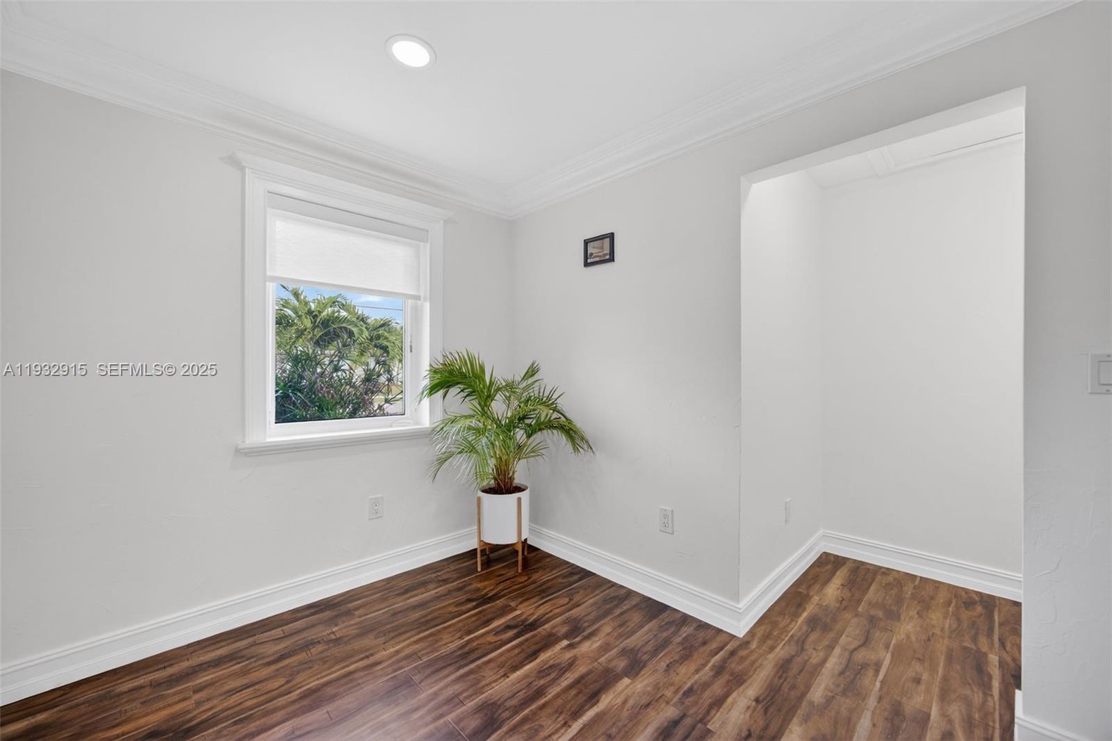 11260 Southwest 48th Street Miami, FL 33165 - Photo 29 of 48 a view of an empty room with a window