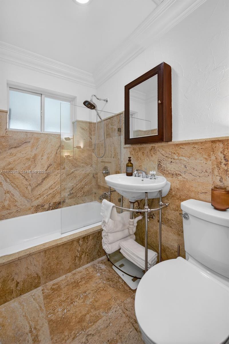 11260 Southwest 48th Street Miami, FL 33165 - Photo 32 of 48 a bathroom with a sink toilet and mirror