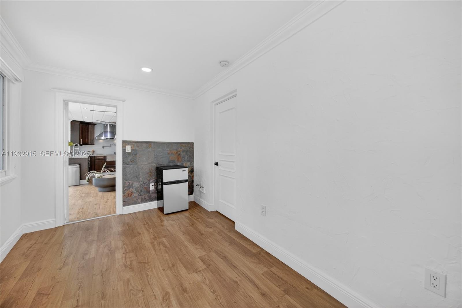 11260 Southwest 48th Street Miami, FL 33165 - Photo 35 of 48 a view of a living room with hardwood floor