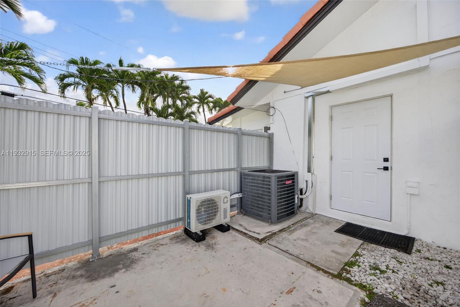 11260 Southwest 48th Street Miami, FL 33165 - Photo 41 of 48 a view of a outdoor space with porch