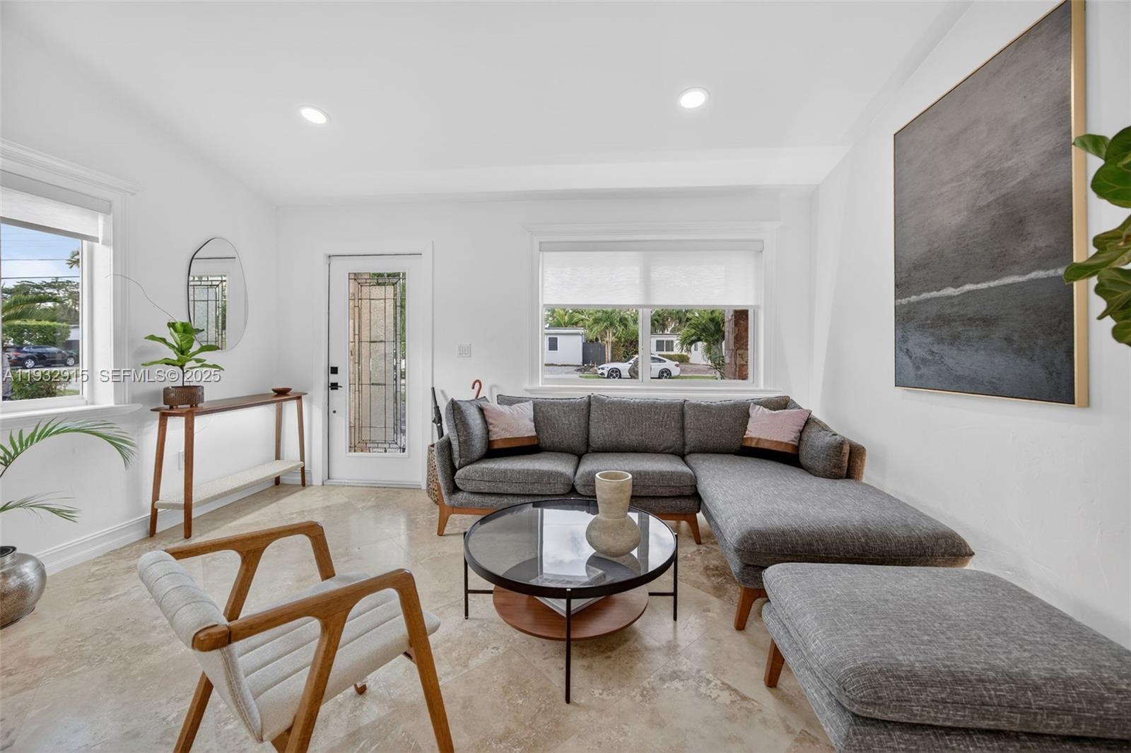 11260 Southwest 48th Street Miami, FL 33165 - Photo 6 of 48 a living room with furniture and a large window