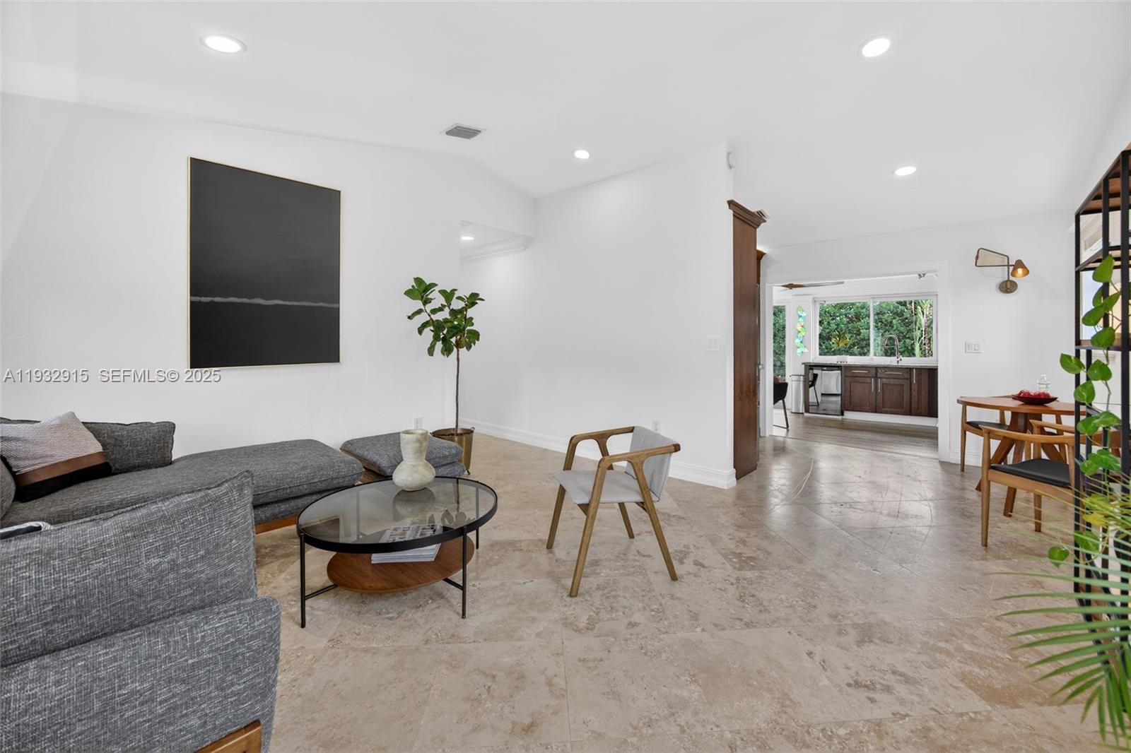 11260 Southwest 48th Street Miami, FL 33165 - Photo 8 of 48 a living room with furniture and a potted plant
