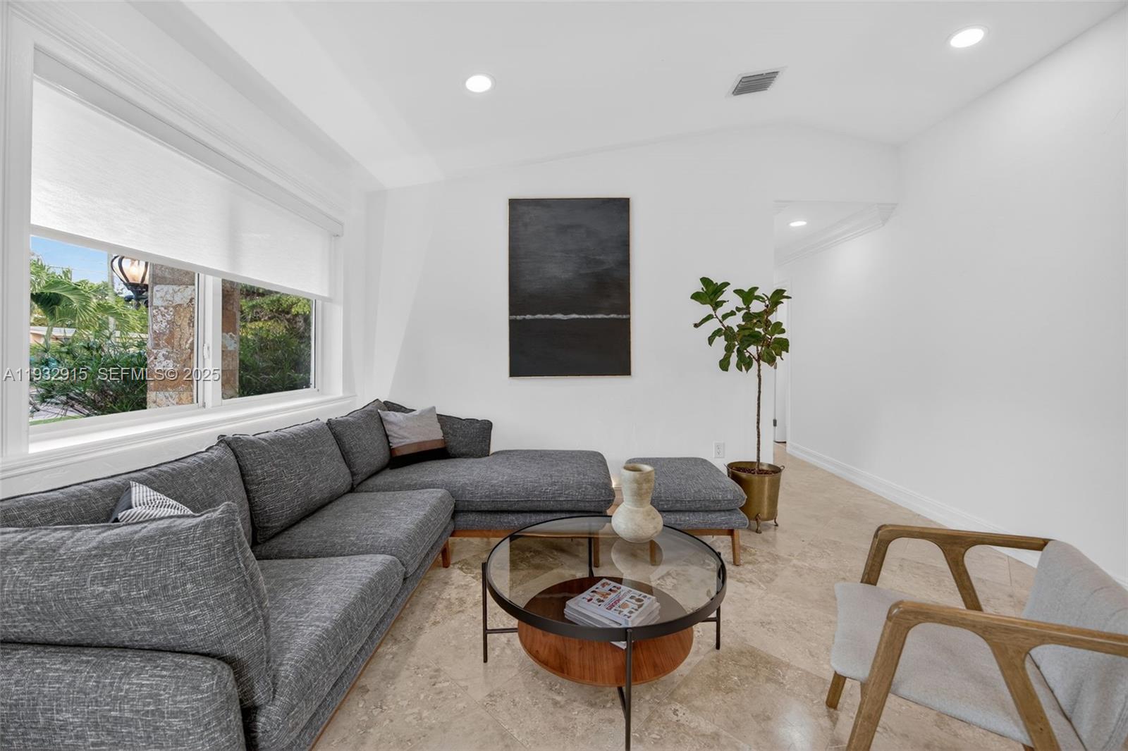 11260 Southwest 48th Street Miami, FL 33165 - Photo 9 of 48 a living room with furniture and a potted plant