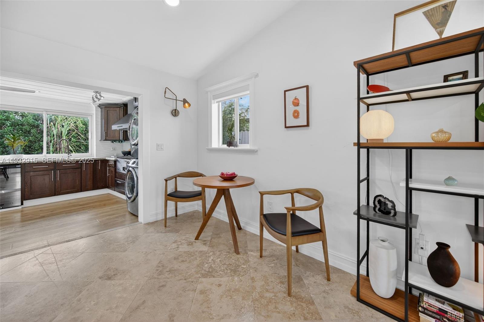 11260 Southwest 48th Street Miami, FL 33165 - Photo 10 of 48 a view of a workspace with furniture and a window