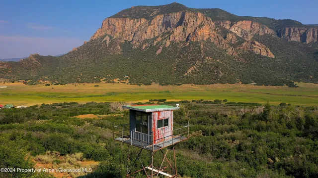 a bedroom with a bed and furniture