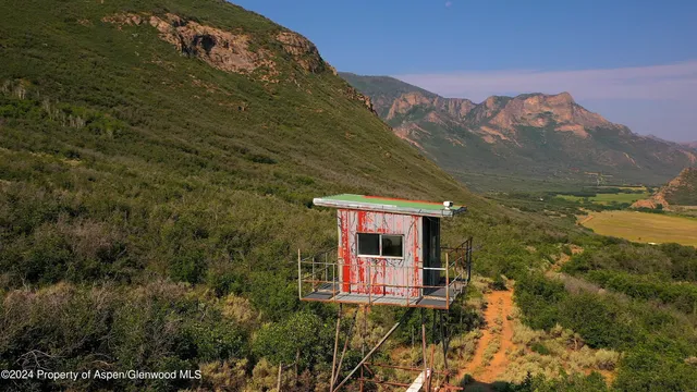 a view of a swimming pool with an ocean view