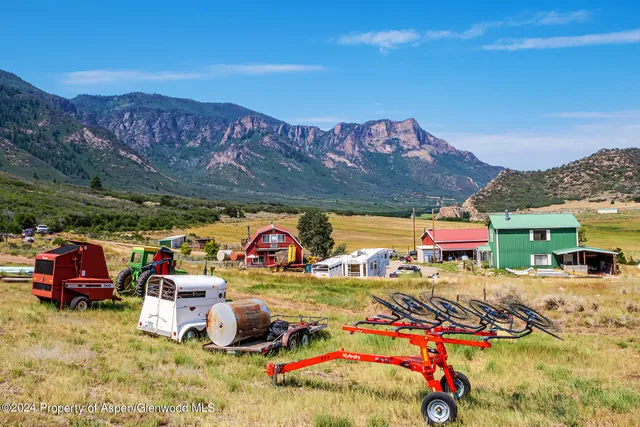 a view of an ocean from a mountain