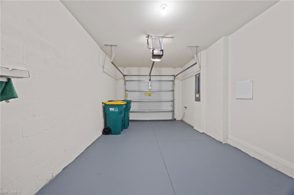 15071 Wildflower Circle Naples, FL 34119 - Photo 22 of 34 a view of a garage