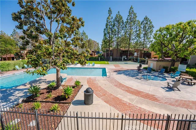 a view of a swimming pool with a patio