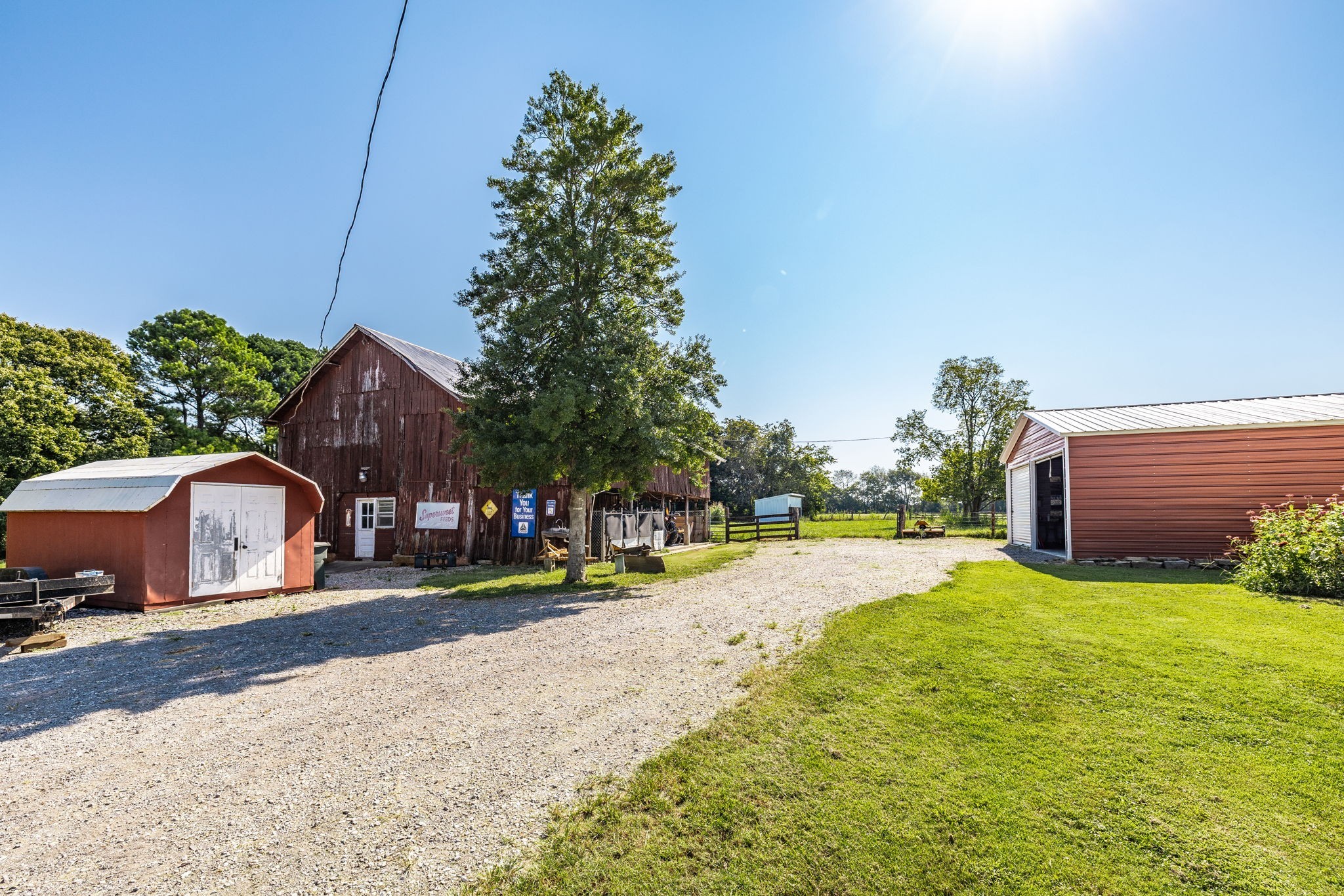 475 Fowler Ford Road Portland, TN 37148 - Photo 40 of 100 a view of a house with a yard and garage