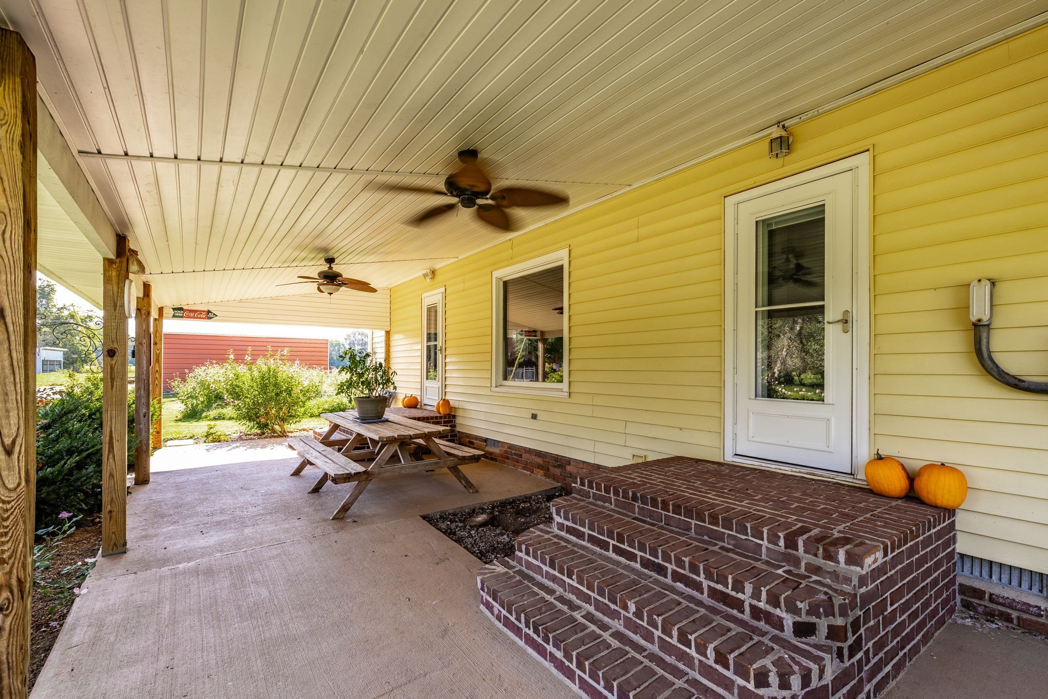 475 Fowler Ford Road Portland, TN 37148 - Photo 52 of 100 a balcony with furniture and a potted plant