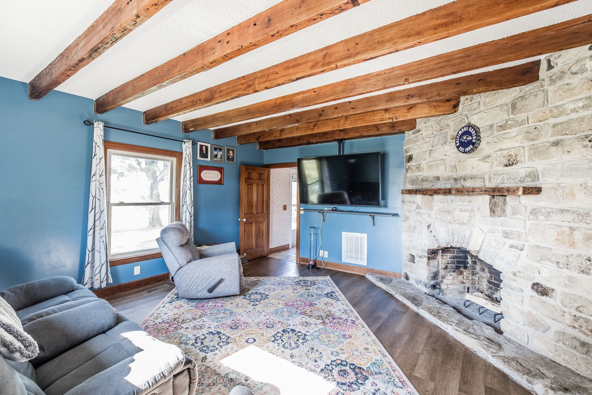 475 Fowler Ford Road Portland, TN 37148 - Photo 59 of 100 a living room with furniture and a flat screen tv