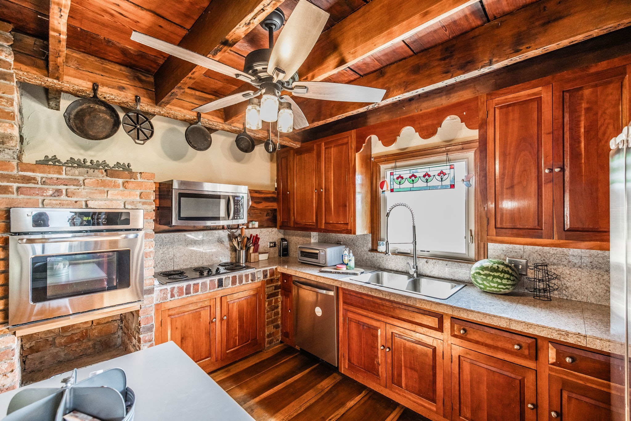 475 Fowler Ford Road Portland, TN 37148 - Photo 66 of 100 a kitchen with stainless steel appliances granite countertop a sink and cabinets