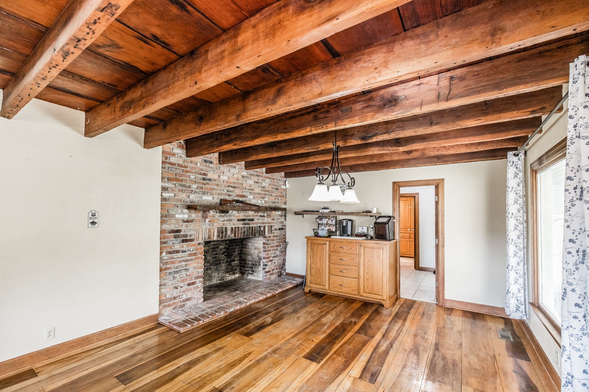 475 Fowler Ford Road Portland, TN 37148 - Photo 73 of 100 a view of a livingroom with wooden floor and a fireplace