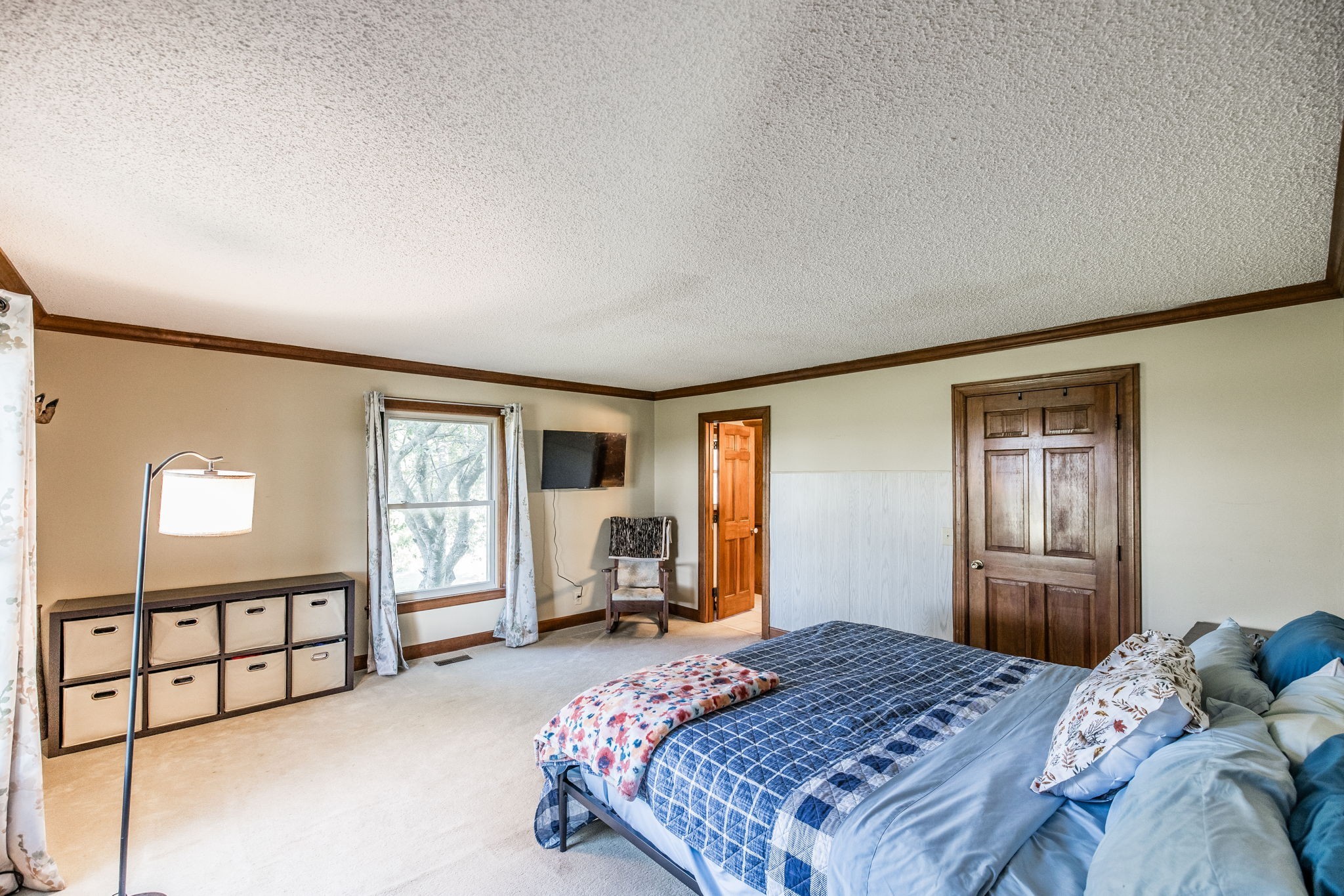 475 Fowler Ford Road Portland, TN 37148 - Photo 75 of 100 a bedroom with a large bed and a window