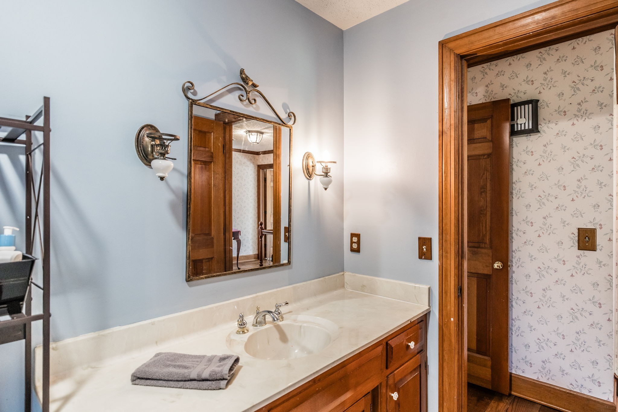 475 Fowler Ford Road Portland, TN 37148 - Photo 93 of 100 a bathroom with a sink a mirror and a shower