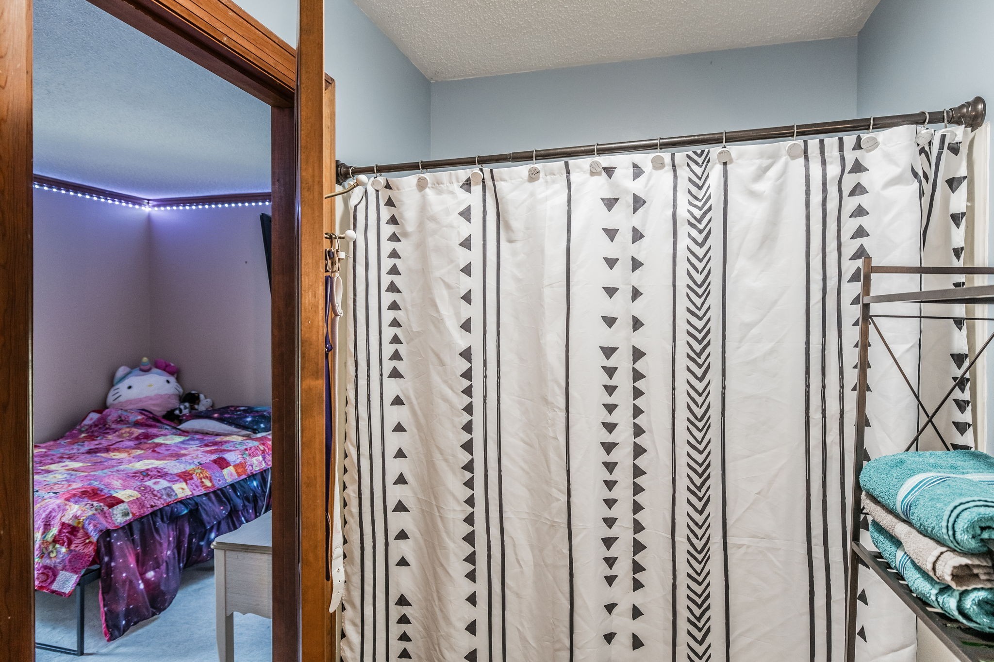 475 Fowler Ford Road Portland, TN 37148 - Photo 94 of 100 a bedroom with a bed and a curtain