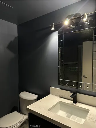 a bathroom with a sink and a toilet